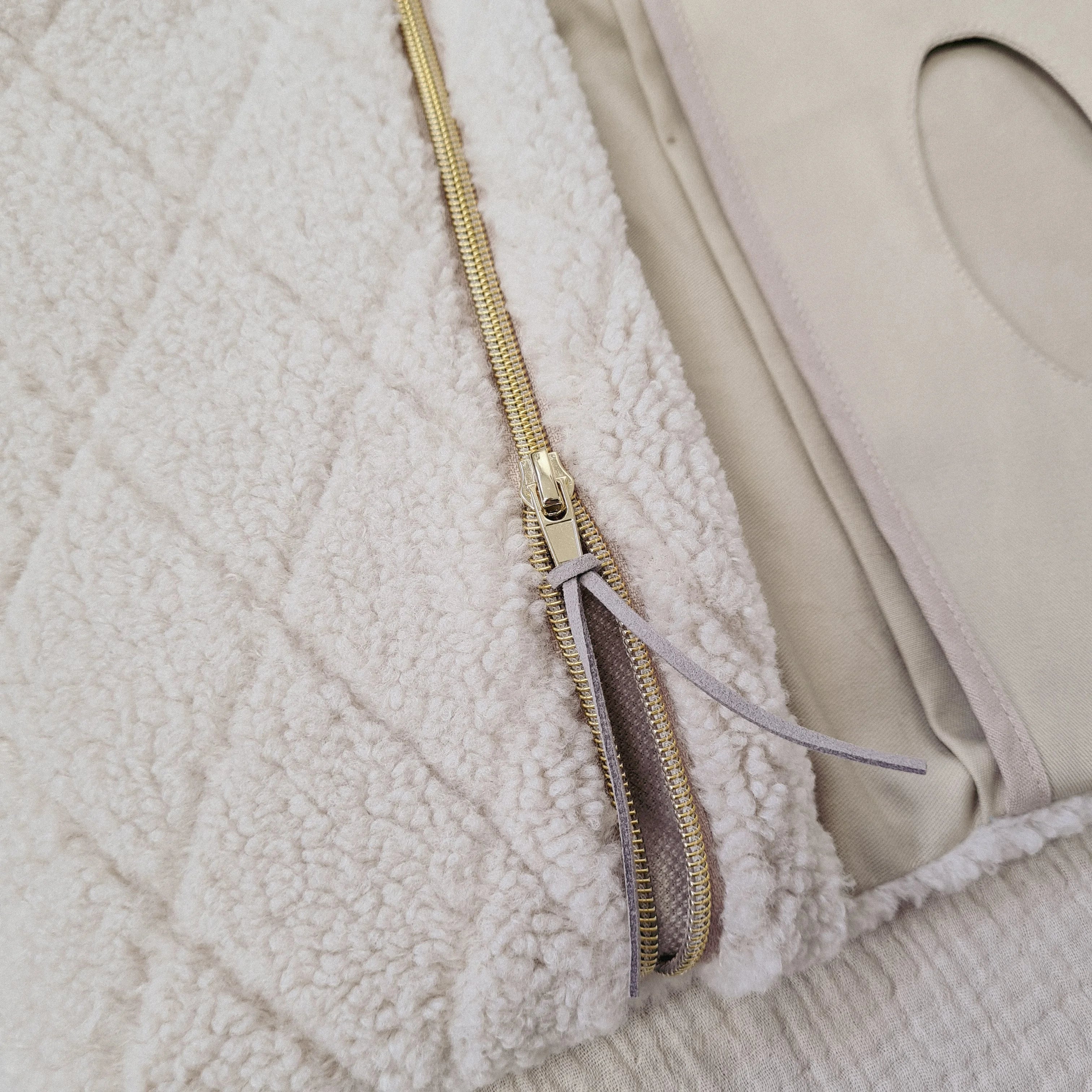 Windeltasche Teddyfell creme rauten