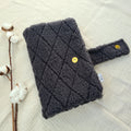 Windeltasche Teddyfell schwarz rauten